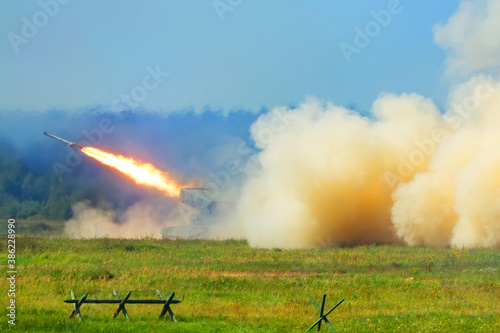 military exercises of artillery at the training ground photo