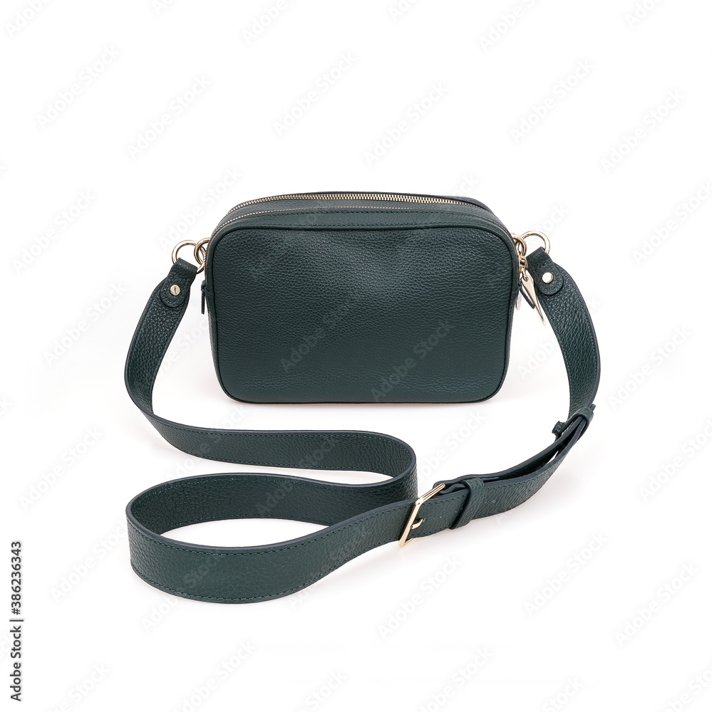 Elegant green female cross body bag isolated on white background Elegant green female cross body bag isolated on white background