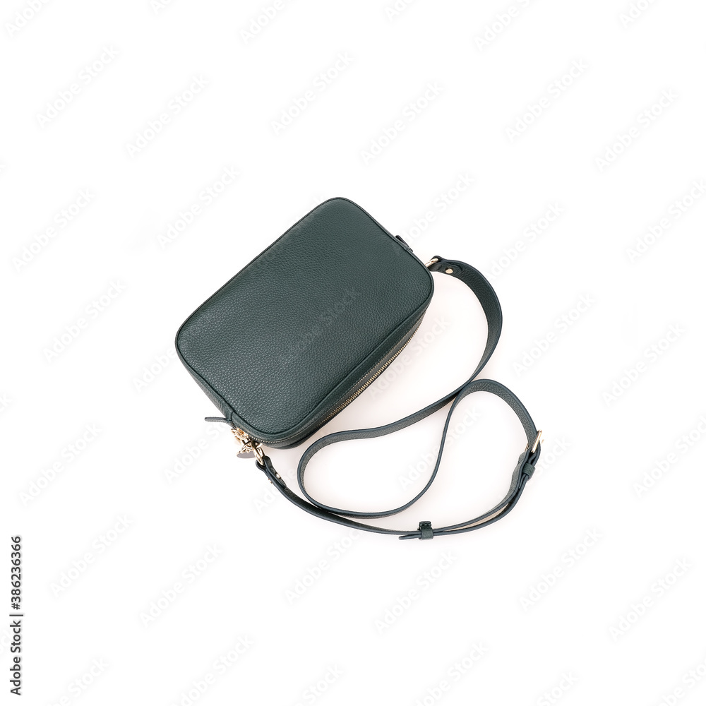 Elegant green female cross body bag isolated on white background Elegant green female cross body bag isolated on white background