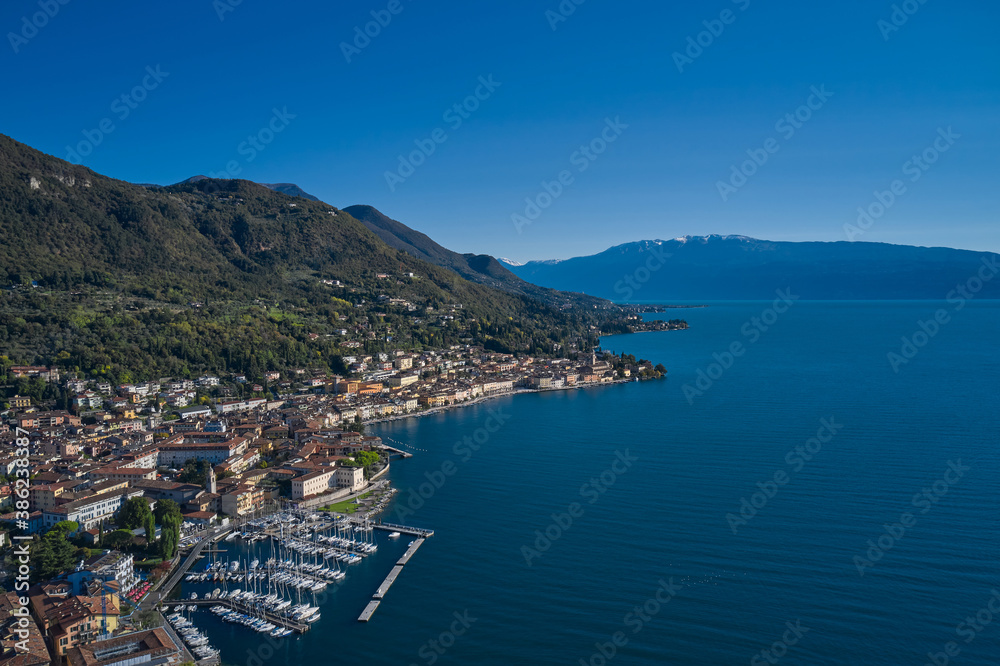 Boat parking top view. Panoramic view of the historic part of Salò on Lake Garda Italy. Tourist site on Lake Garda. Aerial view of the town on Lake Garda.