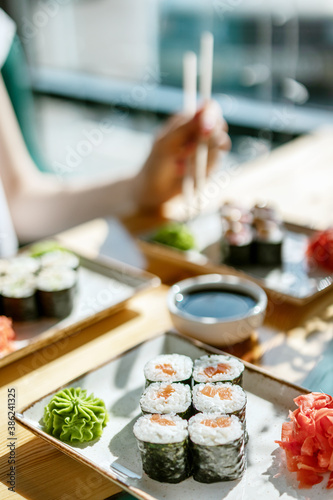 sushi rolls with seafood on the table