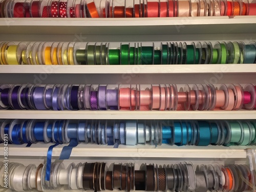 haberdashery haberdasher ribbon reels rolls rows and trims in fabric retail shop  sew sewing supplies for sale retail shop market stock, photo, photograph, image, picture, 
