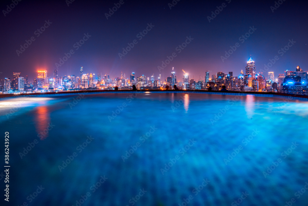 Cityscape of Bangkok with Skyscrapers as Seen from Roof Top with Swimming Pool