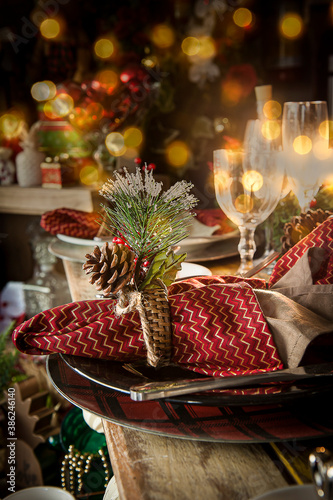 .Christmas table set with bokeh lights. Selective Focus