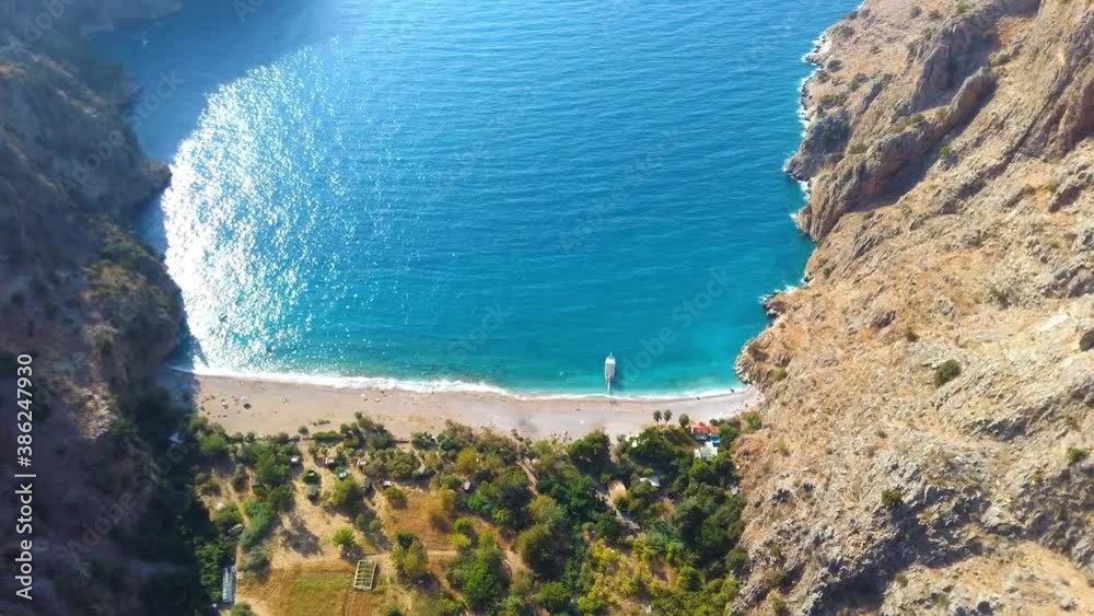 Aerial view of Butterfly Valley beautiful beach in Turkey, Fethiye. Mediterranean beach and valley between rocks