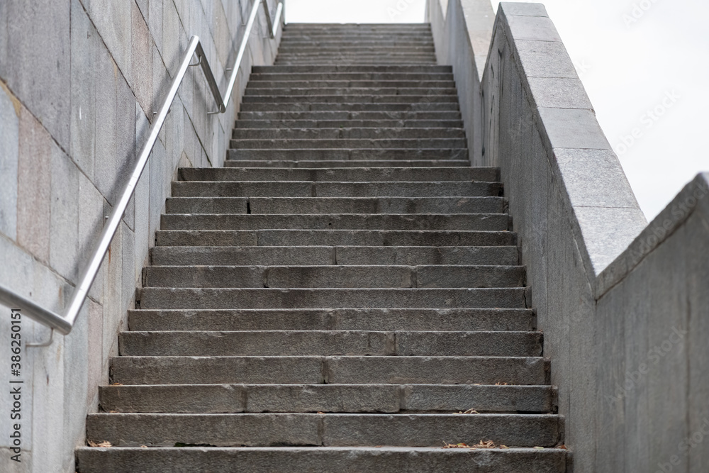 Concrete stairs leading up to the exit Concrete stairs leading up to the exit