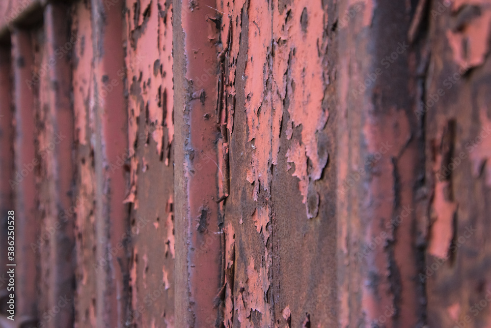 Rust steel surface with chipped paint chunks, grudge. 