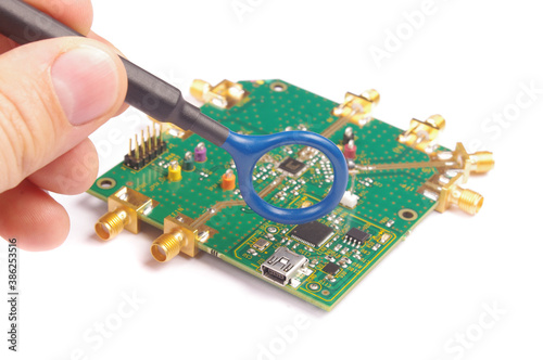 Obraz na płótnie EMC engineer analyzing PCB using near-field probe