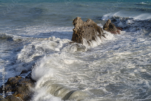 Stormy waves crashing on rocky beach called Galeazza, Province of Imperia, Liguria, northwestern Italy
