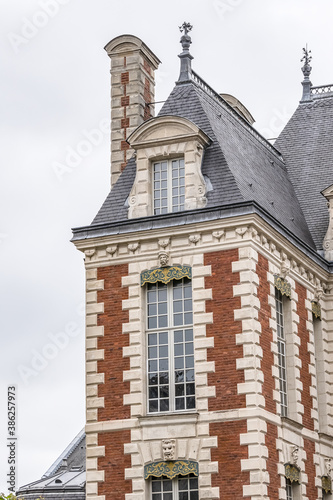 Beautiful architecture of ancient French buildings: Brick and stone building known today as Hotel de Berny built during the years 1633 and 1634. Amiens. Somme department, Picardie, France. 