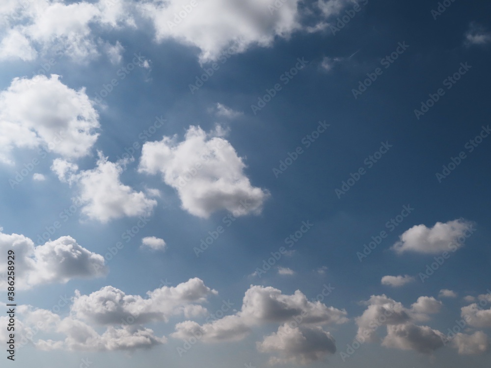 blue sky with fluffy clouds