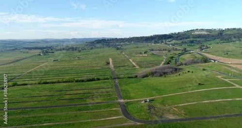 Hover around Mt Panorama in Bathurst city of Australia – farms, fields as 4k.
 photo