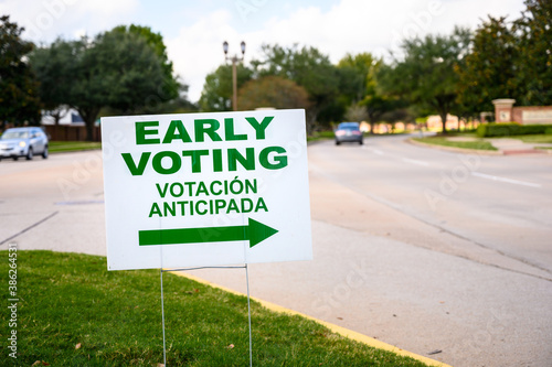 A sign directs residents to an early voting polling location for the 2020 Presidential election.