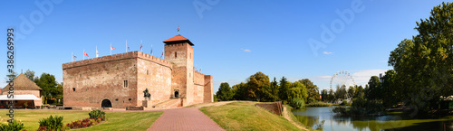 The only remaining brick-built medieval fortress.In front of the castle you can see a boating lake and in the background a Ferris wheel. Big size panorama view, Hungary, Gyula