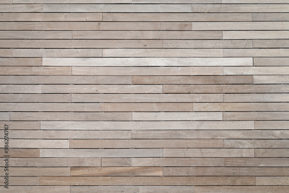 Beautiful natural brown hardwood panels for a terrasse, planks weathered, space for text. close up and no person Beautiful natural brown hardwood panels for a terrasse, planks weathered, space for text. close up and no person