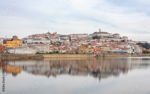 view from the mondegoo river historic center of Coimbra, Portugal.