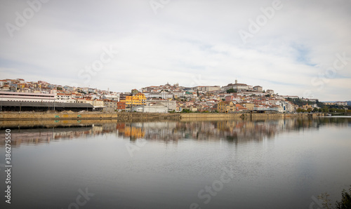 view from the mondegoo river historic center of Coimbra, Portugal.