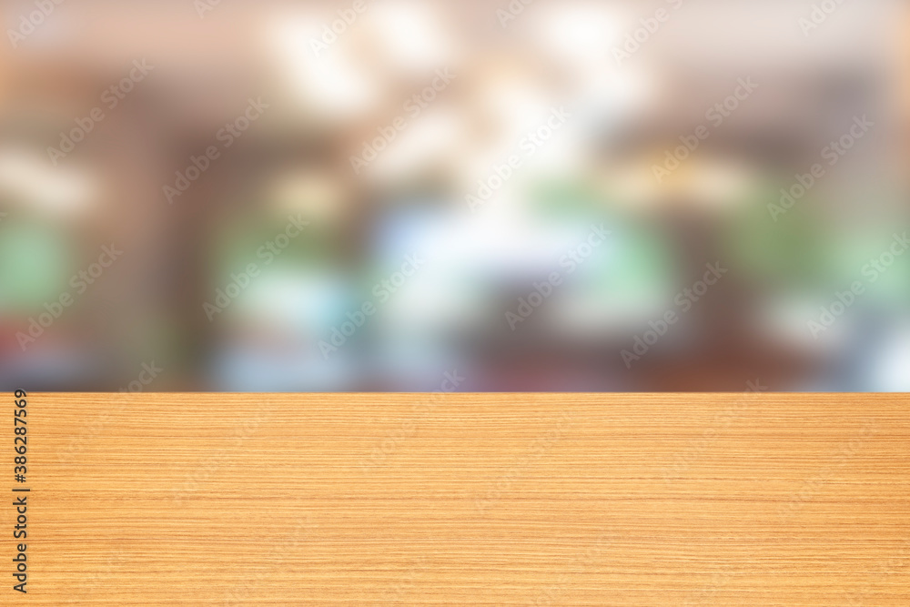 Empty wooden table and blurred modern indoor white kitchen coffee cafe background, restaurants. Ready for product montage display. template Empty wooden table and blurred modern indoor white kitchen coffee cafe background, restaurants. Ready for product montage display. template