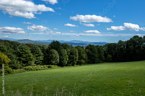 Mountains dot the horizon looking south from the center of Danville, Vermont