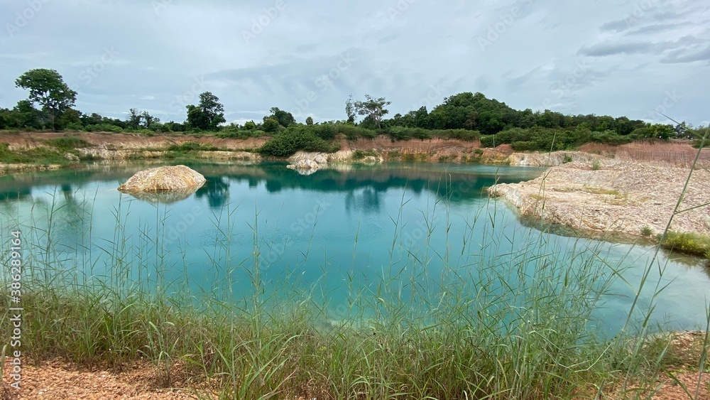 Grand Canyon, a beautiful green pond formed by nature with white rocks, minerals and sulfur, Unseen Thailand, New Tourism, Uttaradit.  Natural background