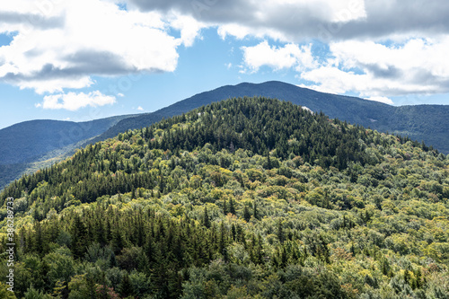 Slika na platnu Middle Sugarloaf Mountain stands in front of Mount Hale, as viewed from the Nort
