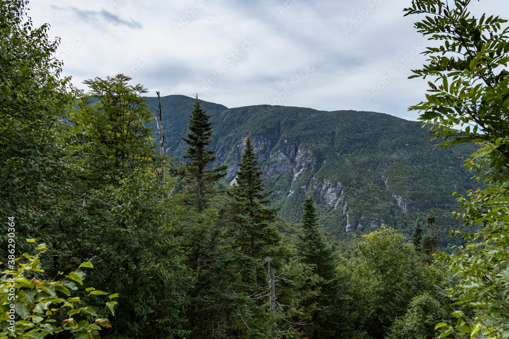 Cliffs form the northeastern side of Mount Mansfield and the western wall of Smuggler's Notch Cliffs form the northeastern side of Mount Mansfield and the western wall of Smuggler's Notch