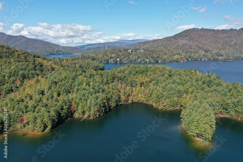 Aerial view of Lake Santeetlah, North Carolina and surrounding national forests in autumn color.