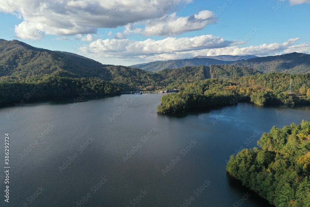 Aerial view of Lake Santeetlah, North Carolina and surrounding national forests in autumn color.