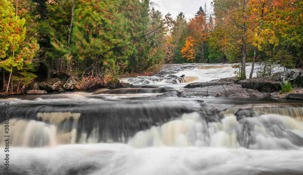 Scenic Upper Bond falls near Paulding in Michigan upper peninsula in autumn time.
