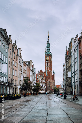 Main City Hall at empty Long Lane street in the old city center of Gdansk, Poland.
