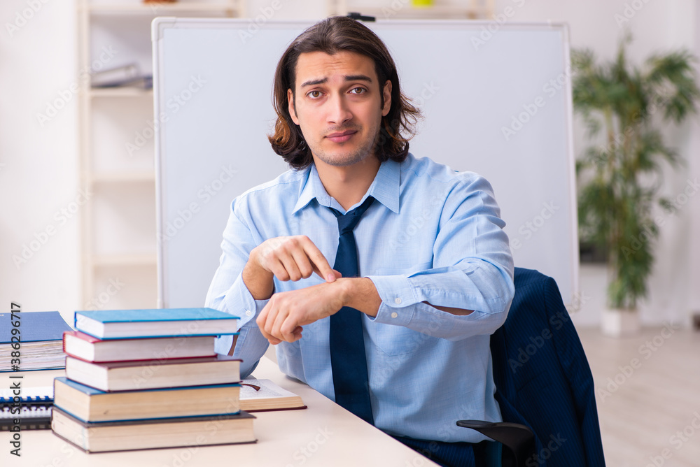 Young businessman student studying at workplace Young businessman student studying at workplace