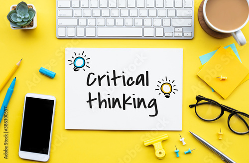  Critical thinking concepts with text on worktable photo