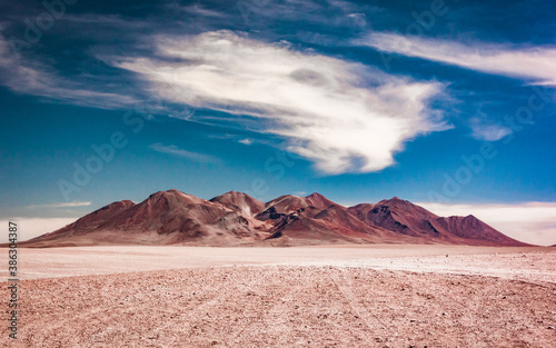 Bolivia Altiplano. Desert landscape with clouds and mountains.