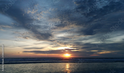 Amazing sunset at Petitenget beach Bali Indonesia