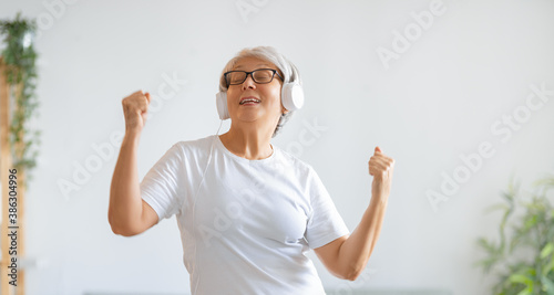 senior woman listening to music