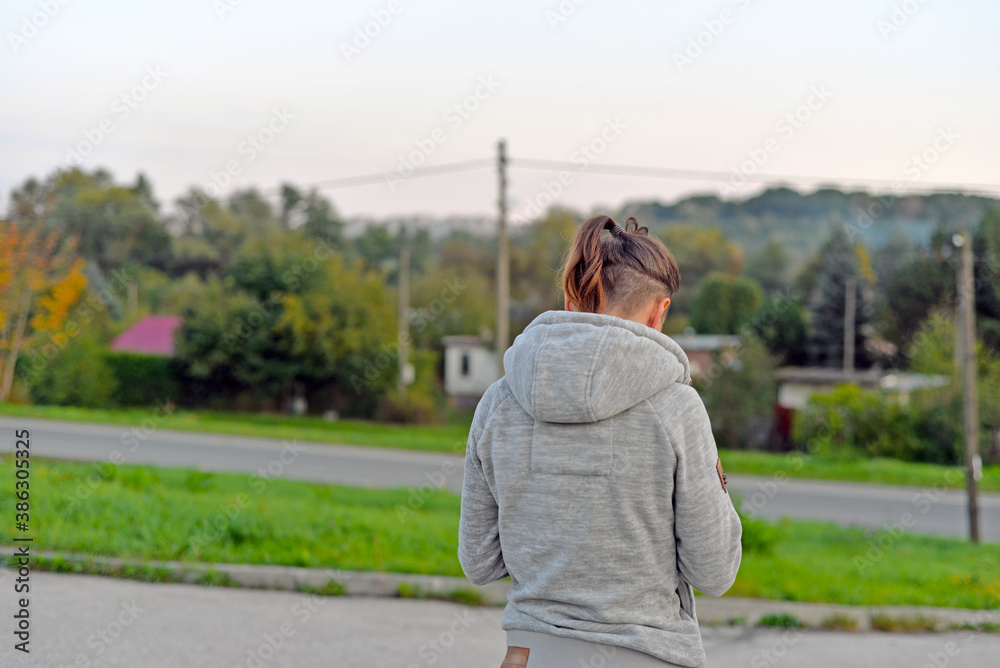 woman walking in the park woman walking in the park