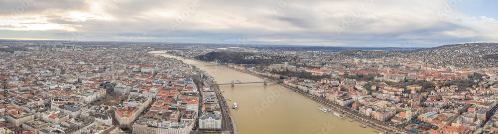 Obraz premium Aerial panoramic drone shot of Budapest by Danube river in winter morning