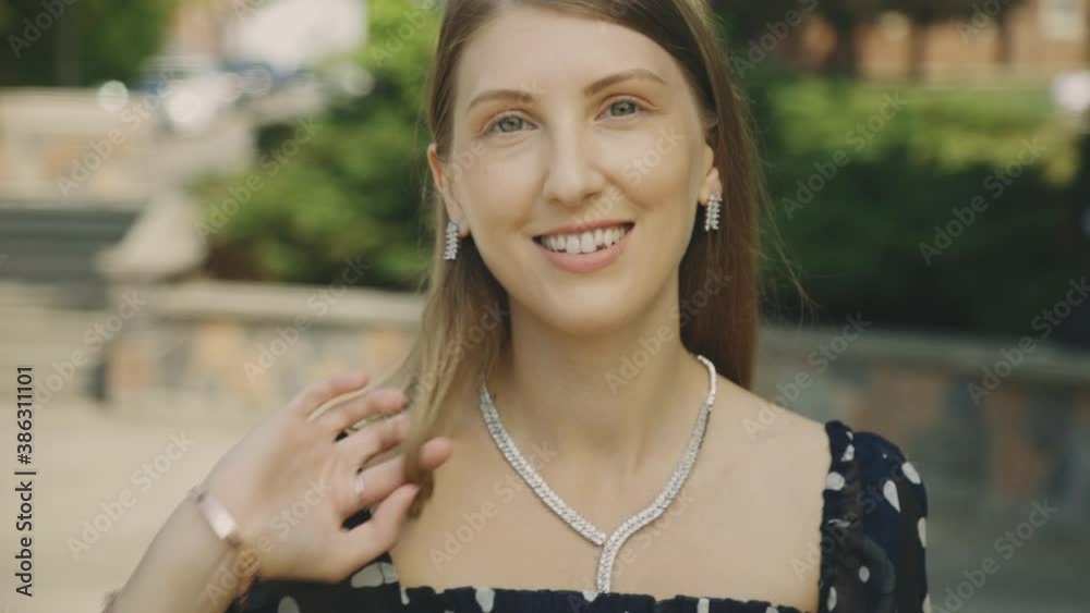 Pretty Long Blonde Hair Woman Posing Smiling Directly To The Camera - Closeup Slow Motion Pretty Long Blonde Hair Woman Posing Smiling Directly To The Camera - Closeup Slow Motion