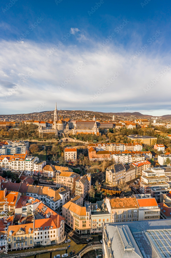 Aerial drone shot of Fisherman's Bastion in Budapest morning sun glow in winter
