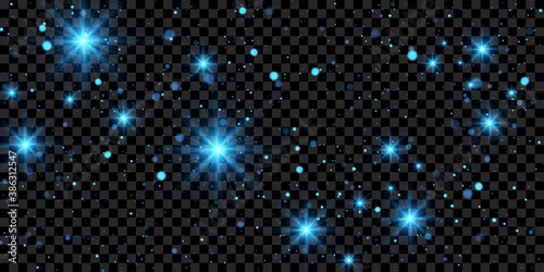 Vector light effect. Sparkling stars and particles isolated on dark transparent background. 