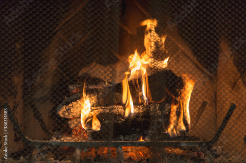 Logs Burning Inside Fireplace