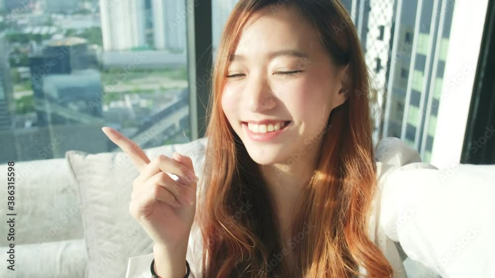 Happy young asian woman using mobile phone and selfie in the city Bangkok, Thailand, Travel vacation city skyscrapers concept. Happy young asian woman using mobile phone and selfie in the city Bangkok, Thailand, Travel vacation city skyscrapers concept.