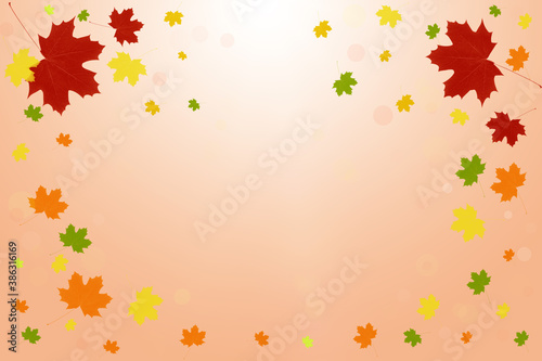 Beautiful bright autumn background with falling maple leaves and bokeh lights. Copy space.