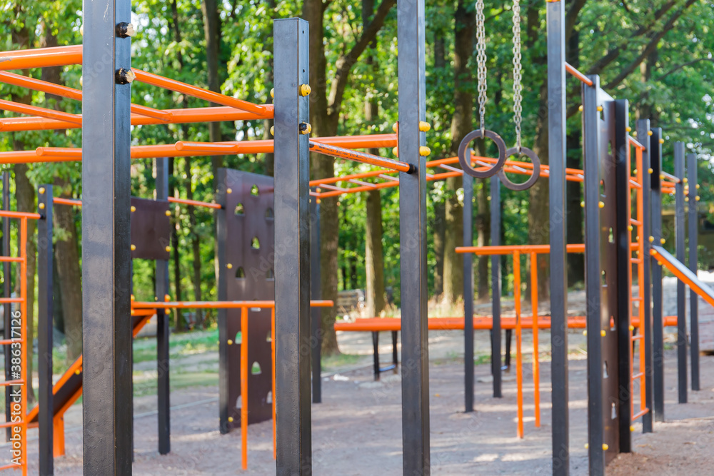 Athletic equipment on outdoor workout area, closeup in selective focus Athletic equipment on outdoor workout area, closeup in selective focus