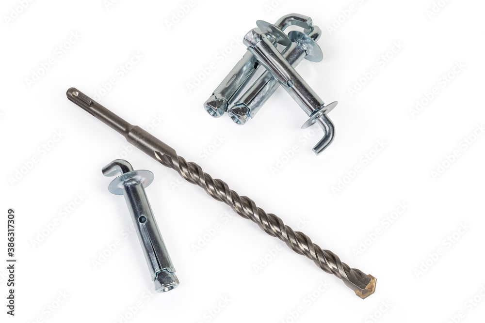 Masonry and concrete drill bit among the wall anchor hooks Masonry and concrete drill bit among the wall anchor hooks