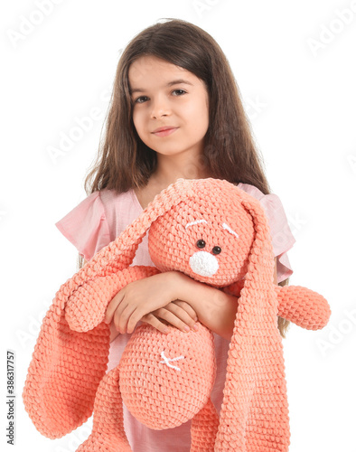 Cute little girl with toy o...