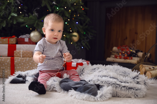 Cute little baby in room de...