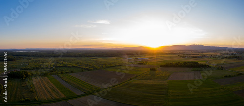 Aerial view of sunset above plantations at the countryside  Croatia.