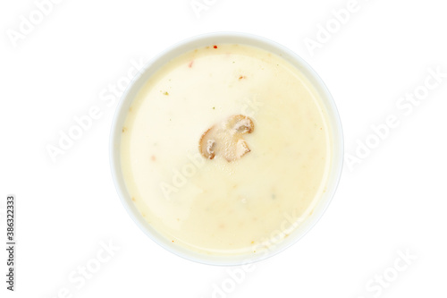 Plate with tasty mushroom soup isolated on white background