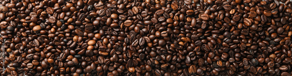 Pile of coffee beans on white background, top view Pile of coffee beans on white background, top view
